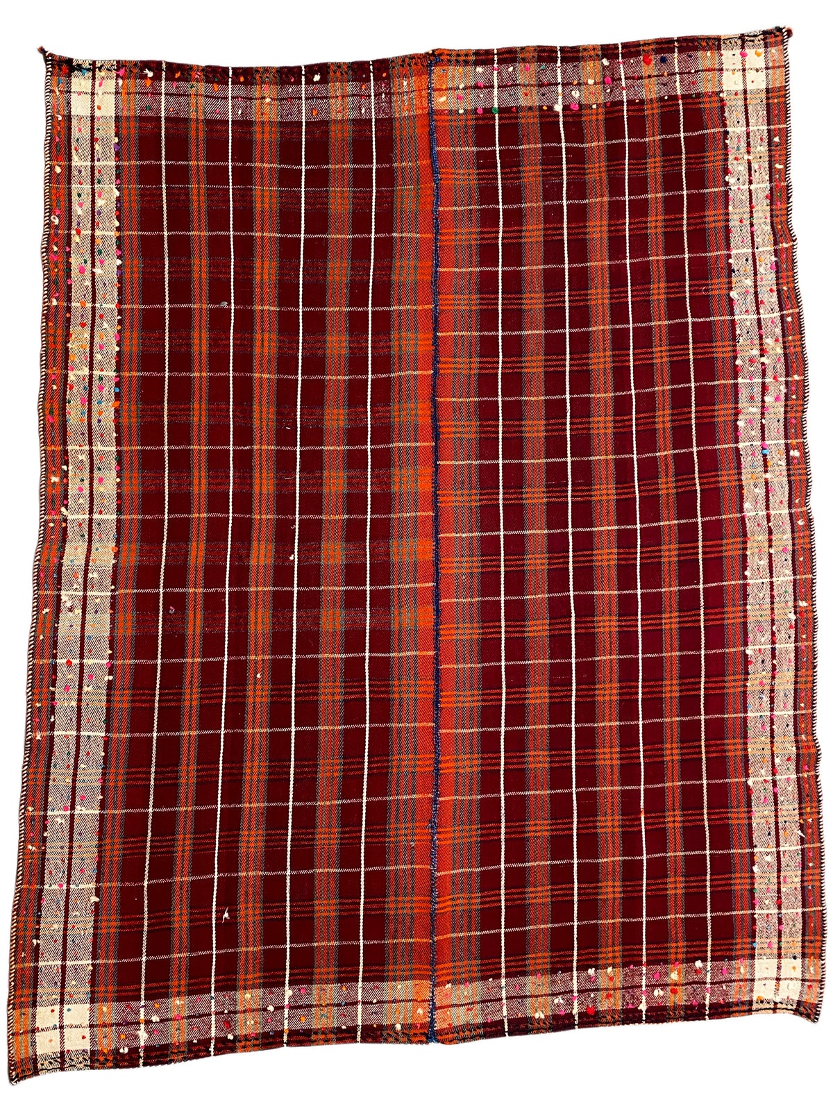 Tapis à carreaux rouges, bordure beige et structure quadrillée uniforme