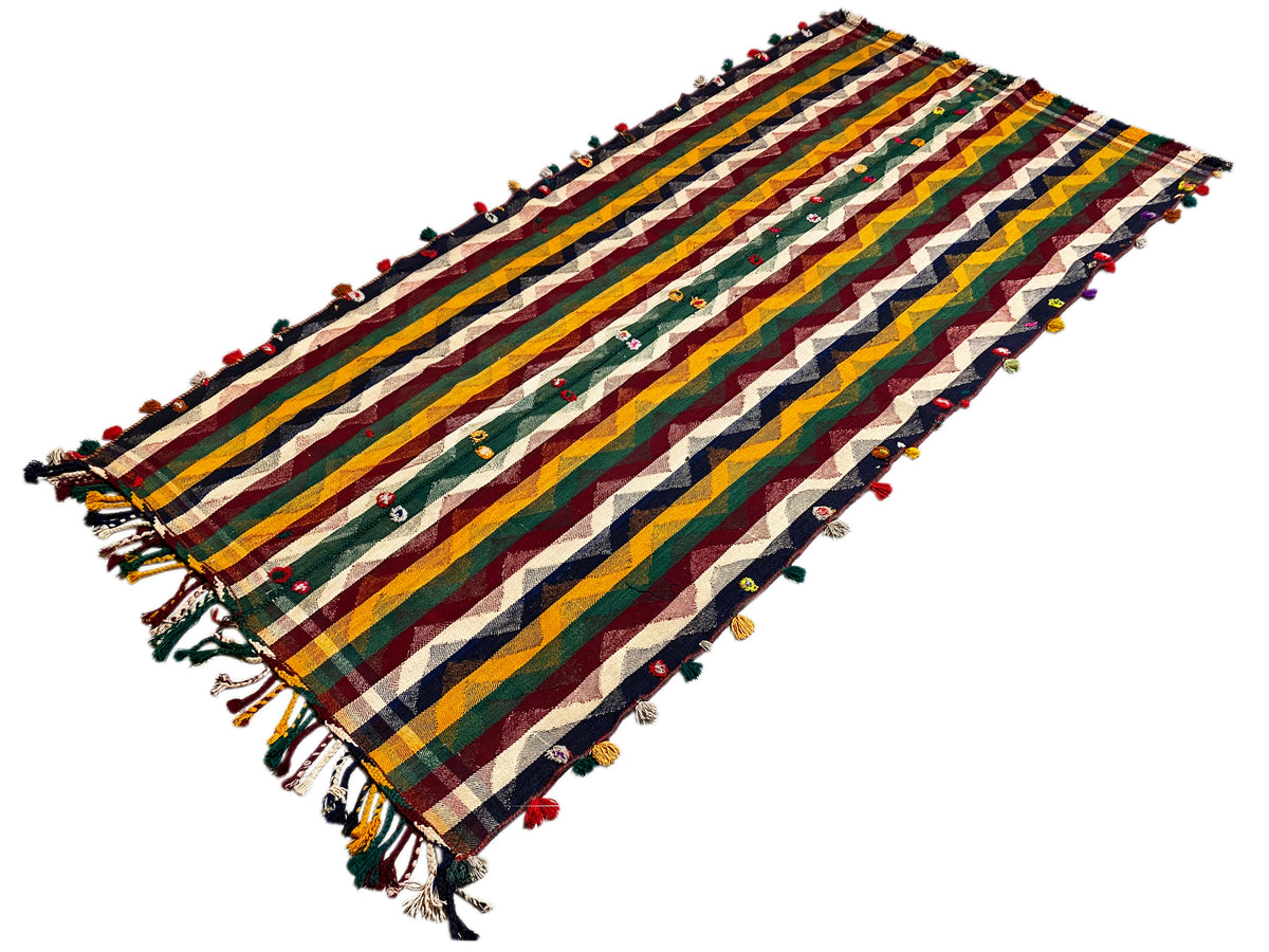 Tapis Jajim à rayures colorées avec des franges et de petits pompons colorés