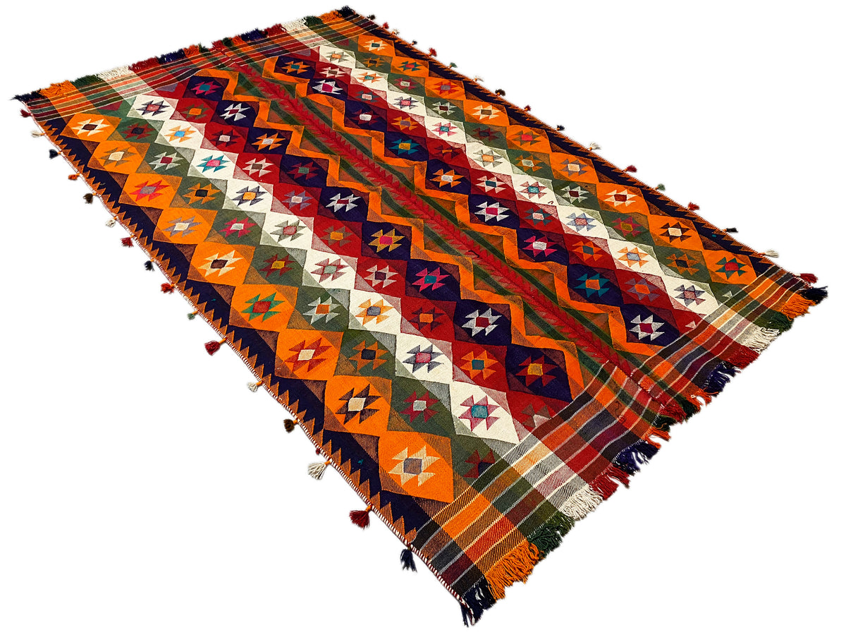Tapis jajim incliné : rangées multicolores de losanges et de croix, franges