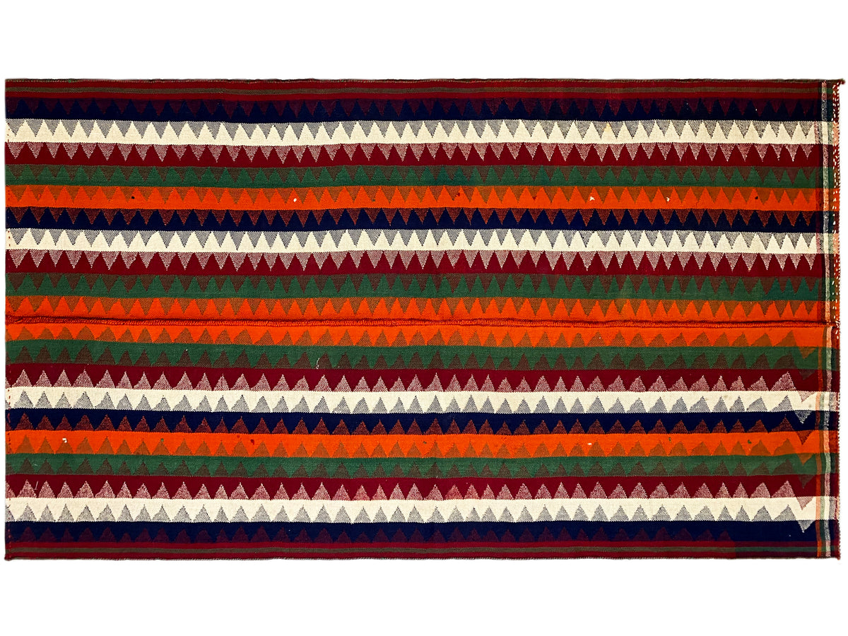 Tapis Jajim, vue transversale : bandes horizontales en zigzag et à rayures en rouge, vert, bleu et crème