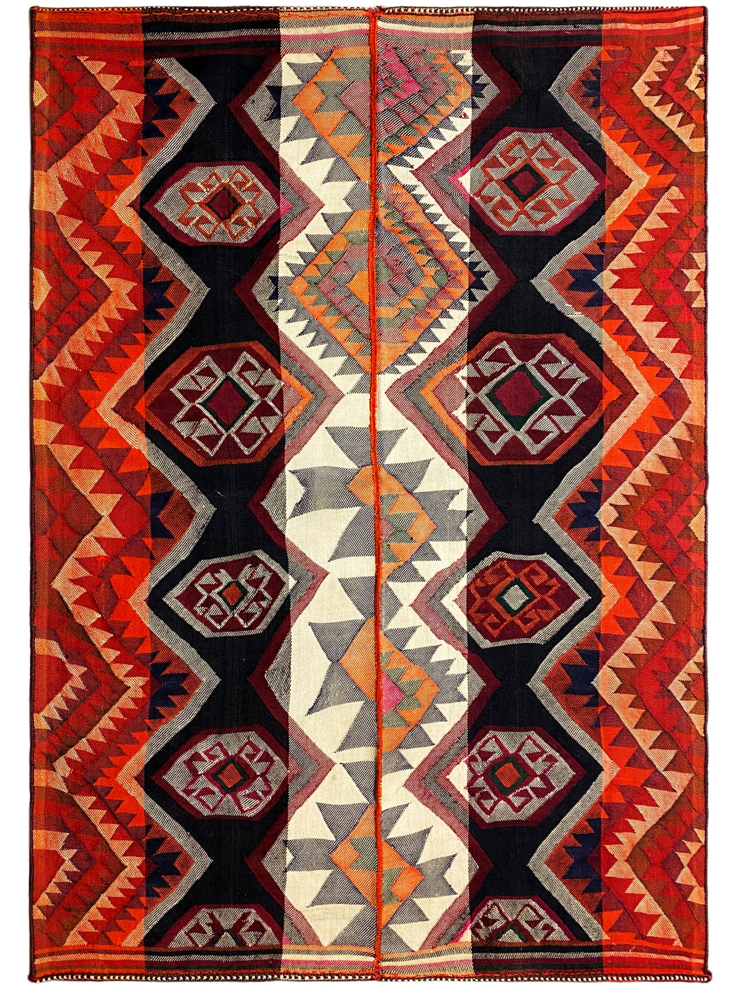 Schlafzimmer traditioneller Jajim Wollteppich bunt mit markanten Ornamentformen