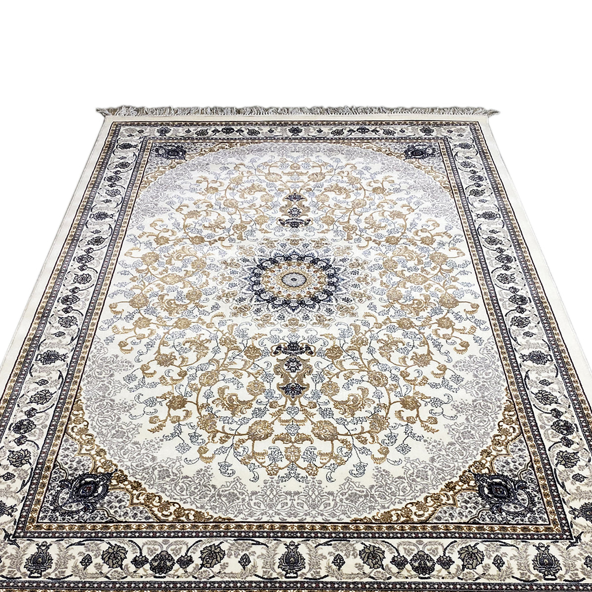 Tapis oriental Leyla d’aspect carré, médaillon couleur crème, bordure bleu foncé, franges