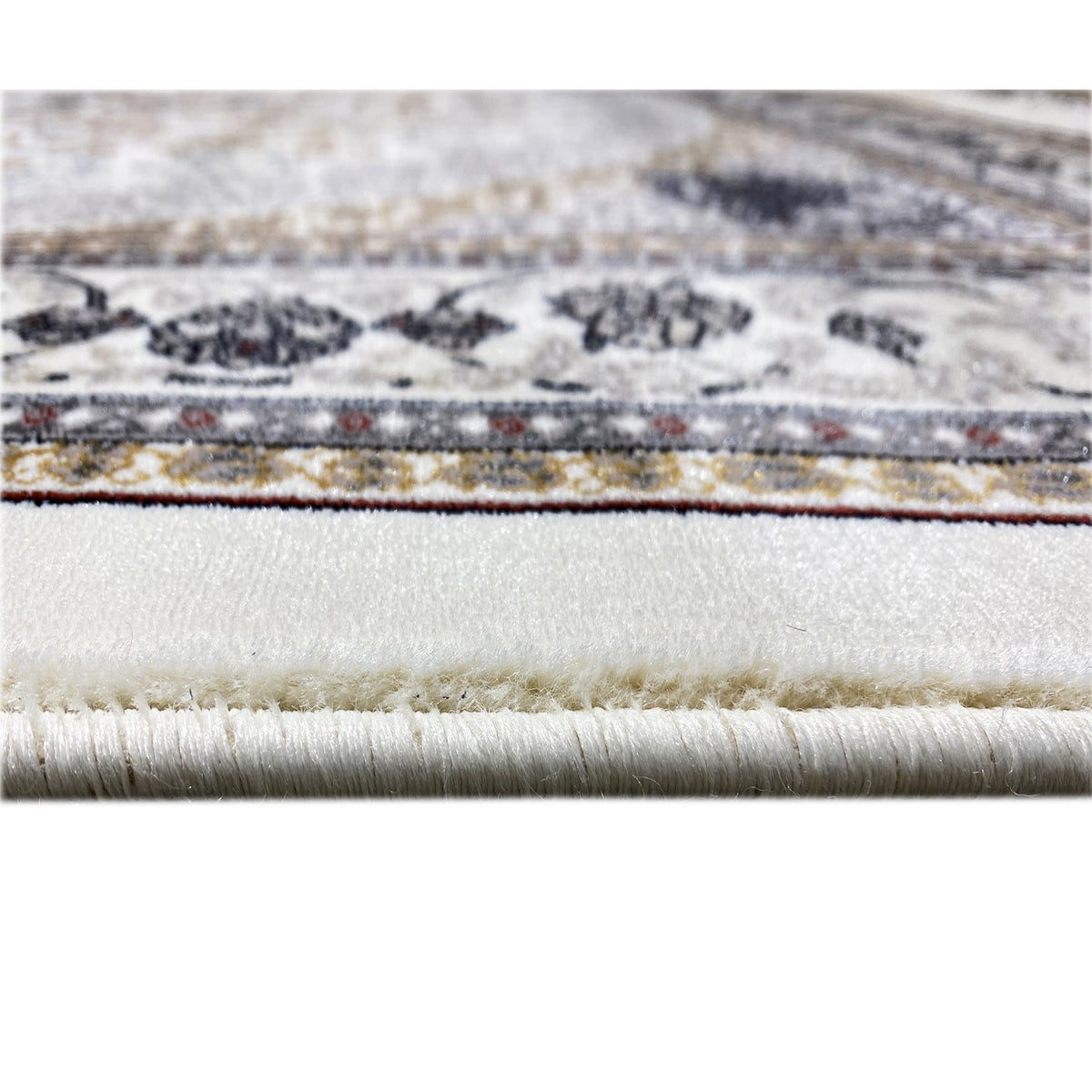 Bordure de tapis oriental à franges, base crème, ornements bleu foncé et dorés