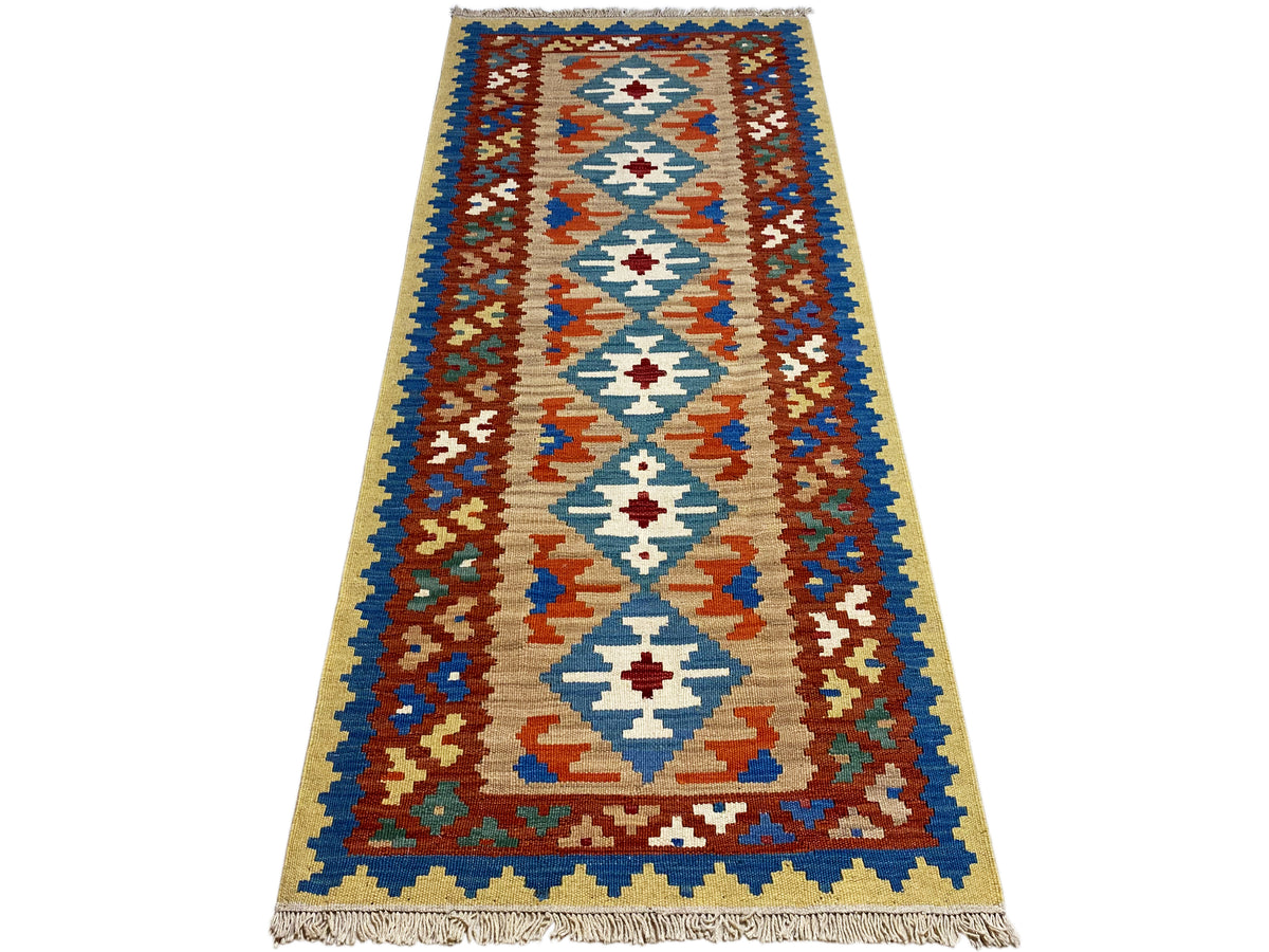 Tapis kilim aux motifs en zigzag et en losanges turquoise et brun-rouge