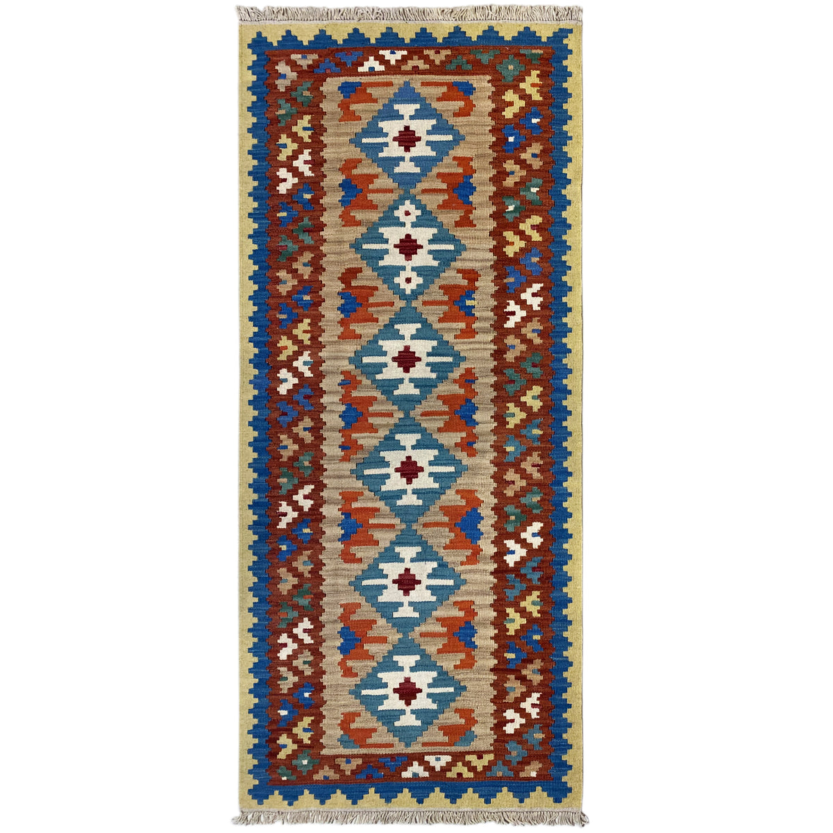 Tapis kilim, vertical : rangée symétrique de losanges en bleu, rouge, crème et vert