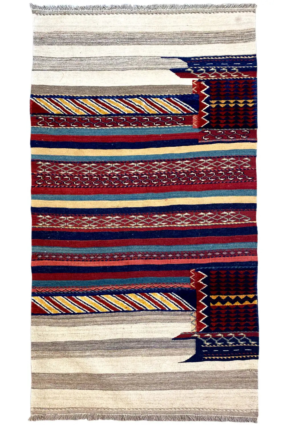 Tapis kilim à rayures horizontales et losanges bleus, rouges et beiges, avec franges
