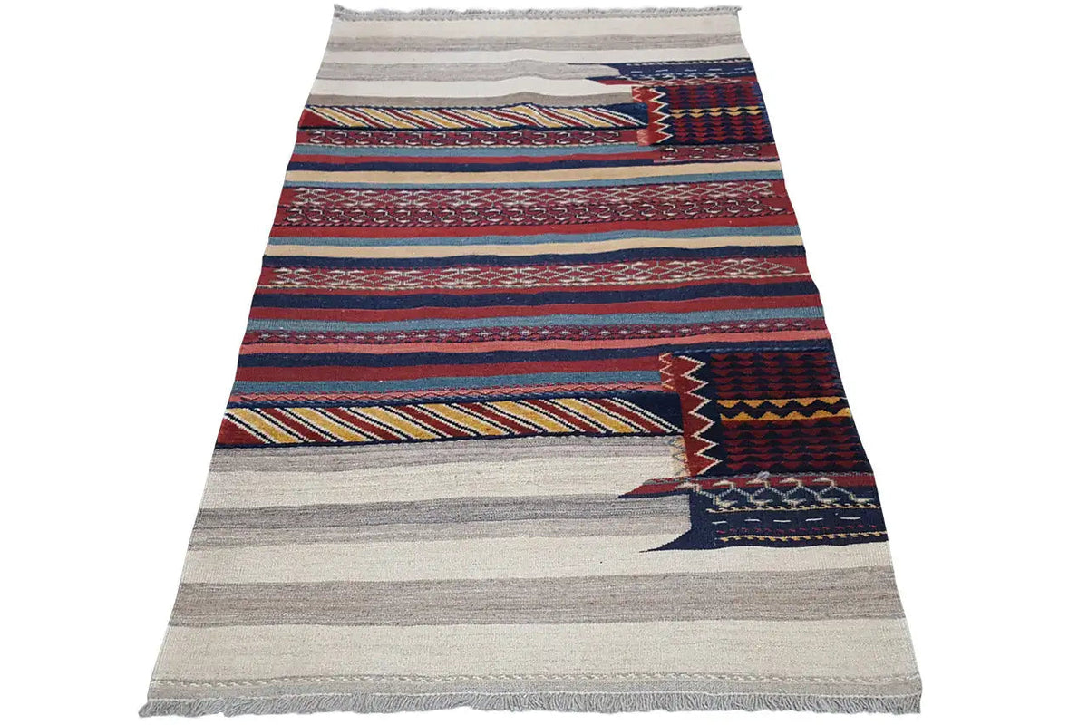Kilim oriental à rayures et losanges bleus, rouges et beiges, avec franges