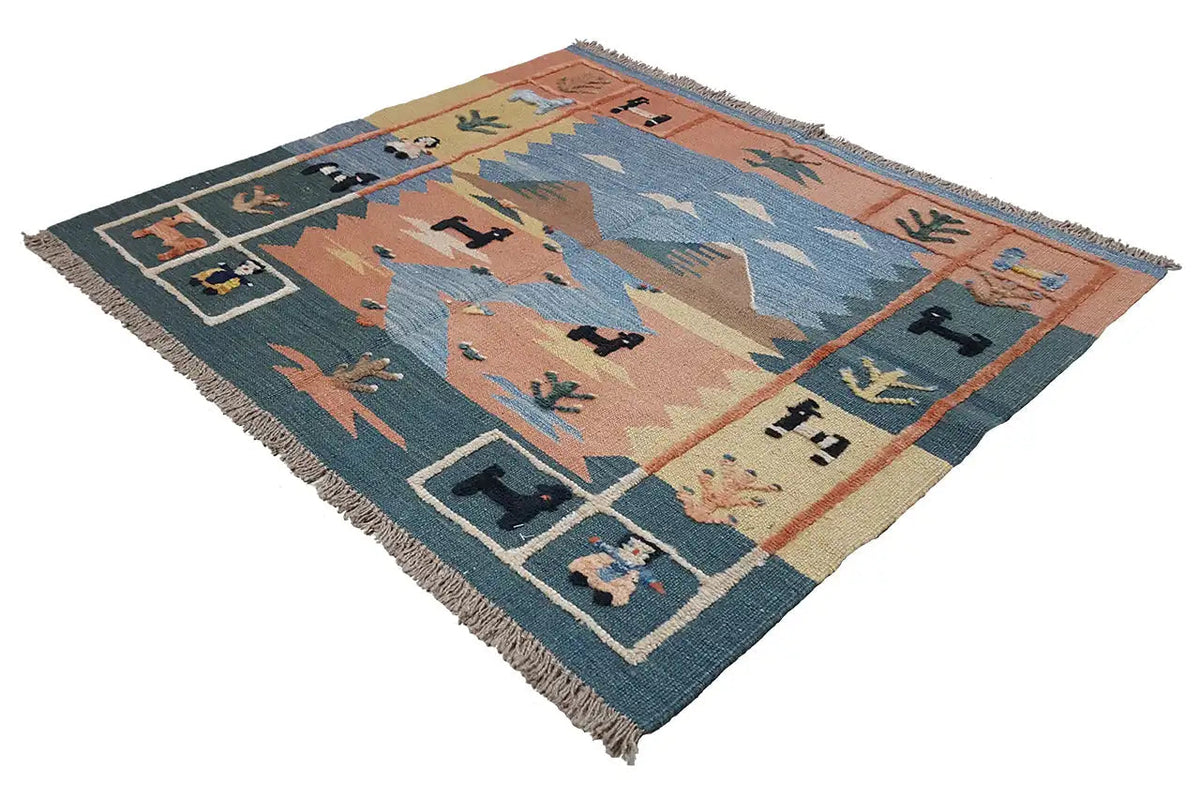Tapis kilim à motif géométrique orange, bleu et pétrole foncé, avec franges