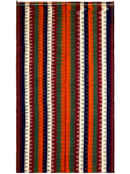 Schlafzimmer traditioneller Jajim Teppich aus Wolle im Boho-Muster