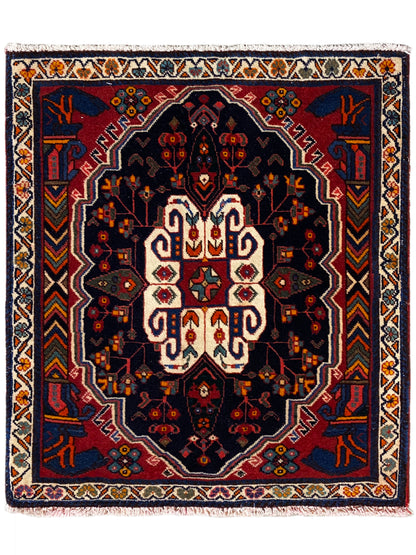 Tapis Poshti au design carré avec fond bleu et motif ornemental blanc et rouge