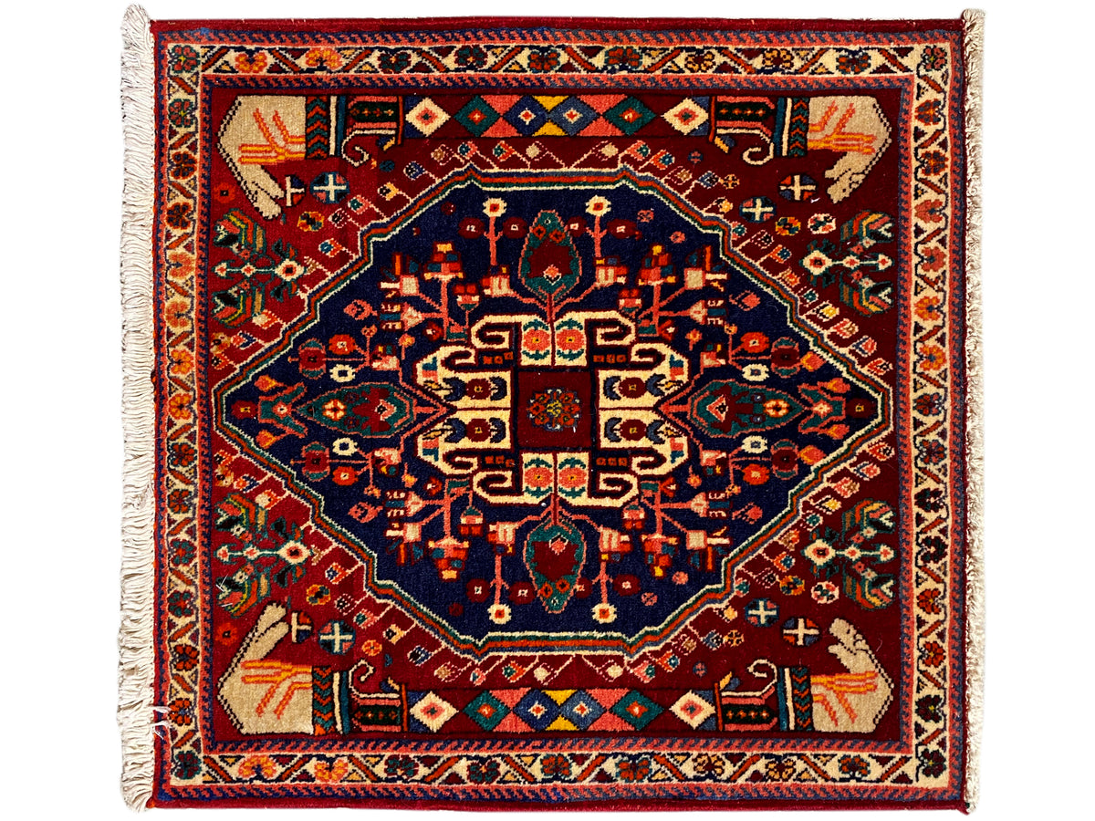 Tapis Poshti 64x64 cm, carré, médaillon central bleu foncé, ornements colorés, franges