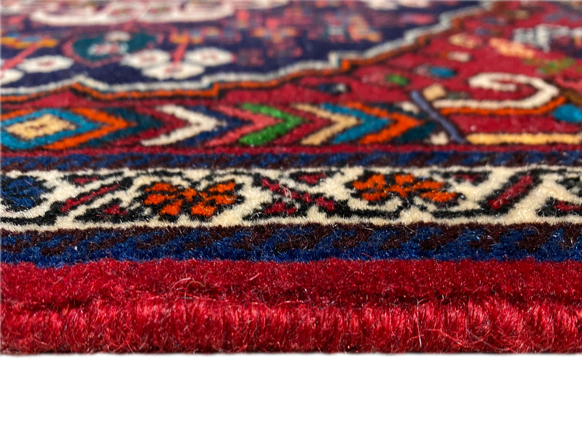 Bordure de tapis avec motifs en zigzag et à rayures, franges courtes, rouge-bleu