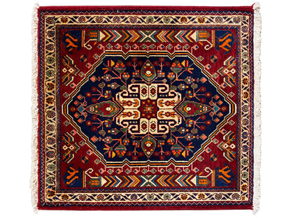 Tapis 63x60 cm bleu foncé à motif rouge, bordure et franges