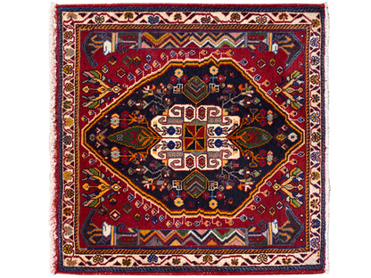 Tapis Poshti (67×67 cm) avec une composition de médaillons en plusieurs parties, en bleu foncé et rouge