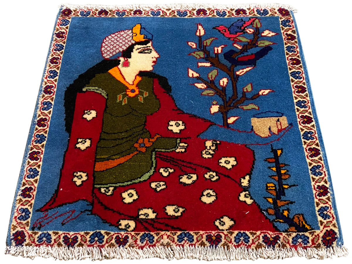 Tapis Poshti 65x63 cm avec motif de conte de fées, surface bleue, partie centrale rouge et franges