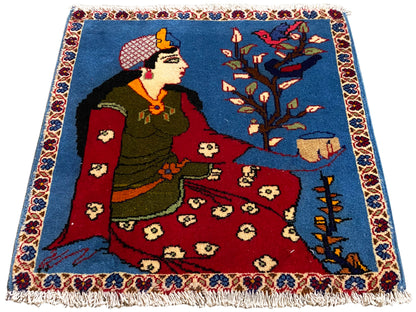 Tapis Poshti 65x63 cm avec motif de conte de fées, surface bleue, partie centrale rouge et franges