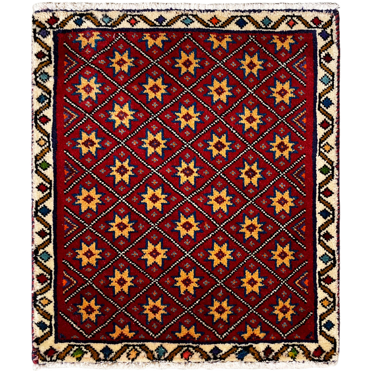 Tapis carré à fond rouge et motif étoilé géométrique multicolore