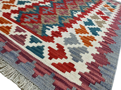 Flachgewebter Kelim Teppich mehrfarbig mit Tribal Design