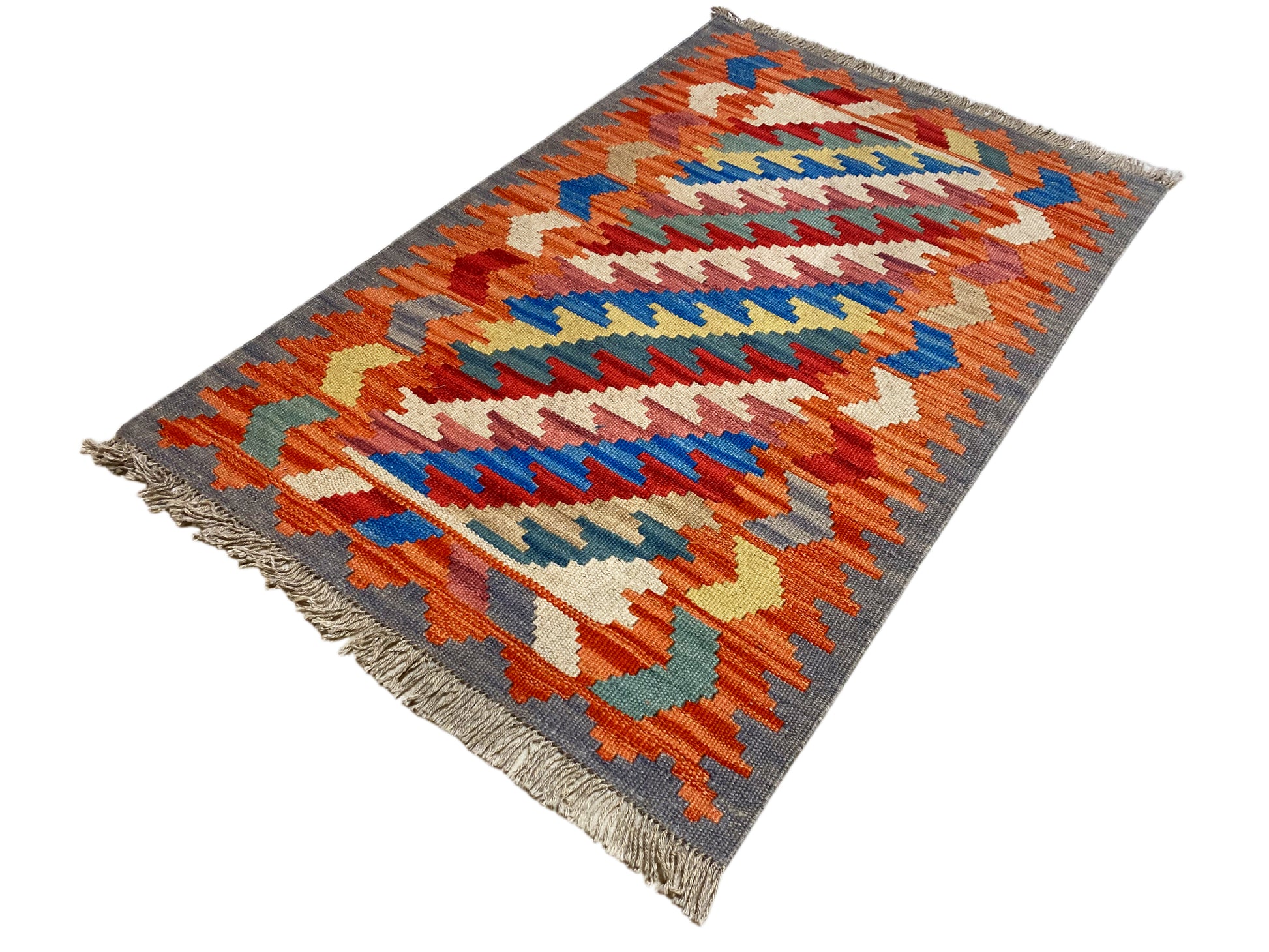 Ethno Kelim Teppich orangefarbener Handwebteppich aus ungefärbter Wolle